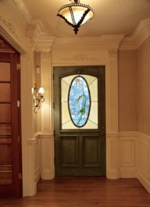 Front door surround tying into crown molding-chairrail-wainscoting_Rob Henson